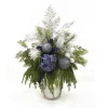 Blue Hydrangeas with Drooping Pine and Glitter Accents in Silver Vase