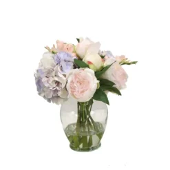 Pink and Lavender Mix of Peonies and Hydrangeas in Round Vase