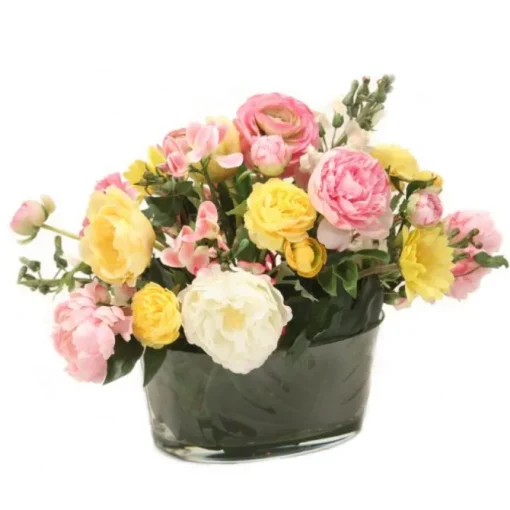 Pink Peonies with Yellow Ranunculas and Tulips Mixed in an Oval Glass Bowl for a Garden Mix Arrangement