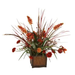 Rust Iris, Ranunculus and Red Hot Poker with Dried Grasses in Leather Chateau Planter