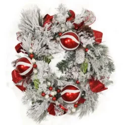 Snow Pine Wreath with Red and White Striped Ornaments and Ribbon
