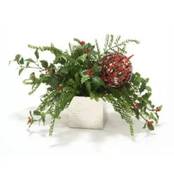 Variegated Holly and Cedar with a Red Ornament in a Nickel Hand Hammered Square Planter
