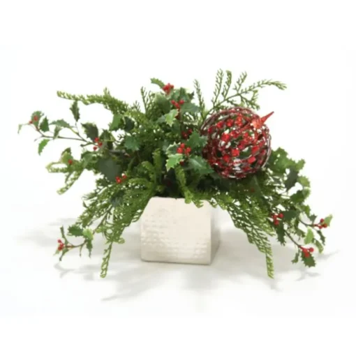 Variegated Holly and Cedar with a Red Ornament in a Nickel Hand Hammered Square Planter